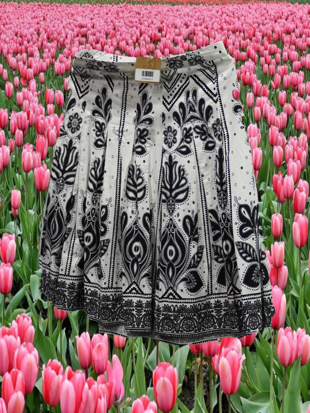 FALDA BLANCA MIDI CON ESTAMPADO NEGRO