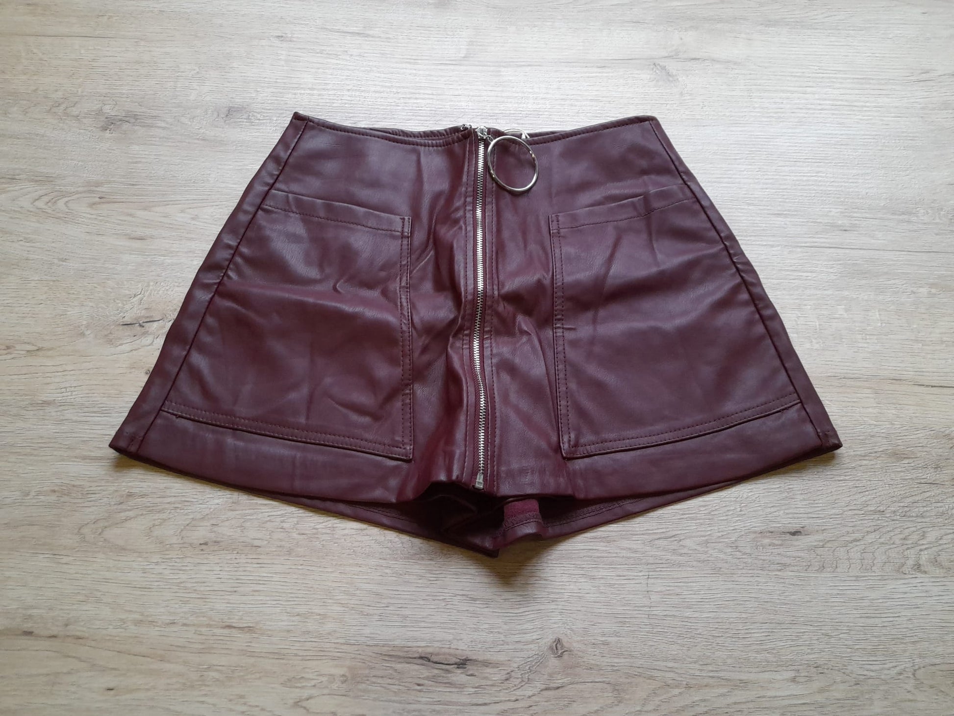 FALDA/PANTALÓN POLIPIEL GRANATE