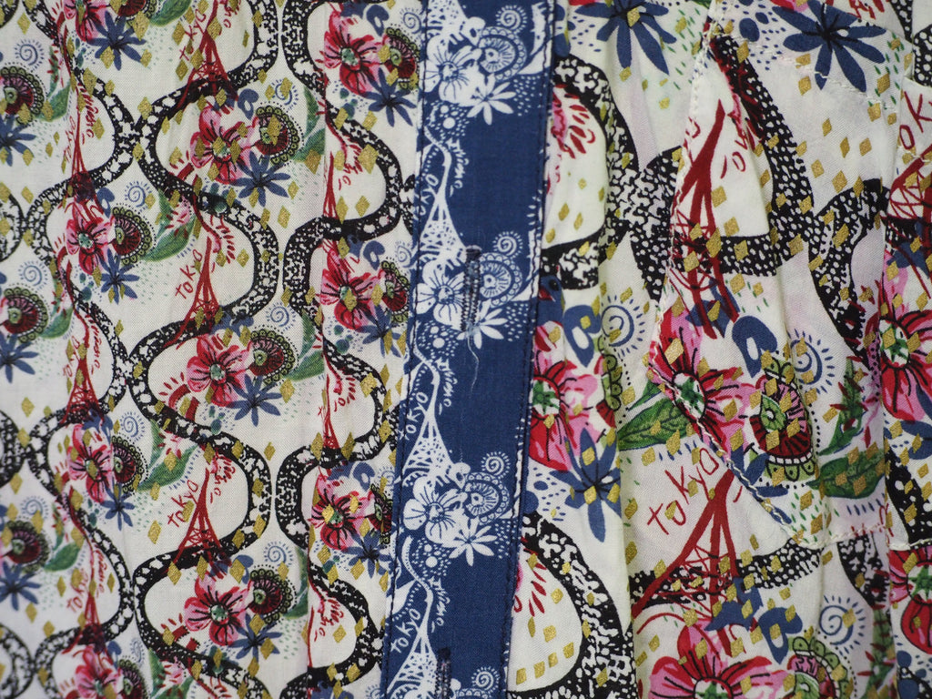 CAMISA SEÑORA MANGA LARGA BLANCA CON ESTAMPADO Y DETALLE EN ESPALDA