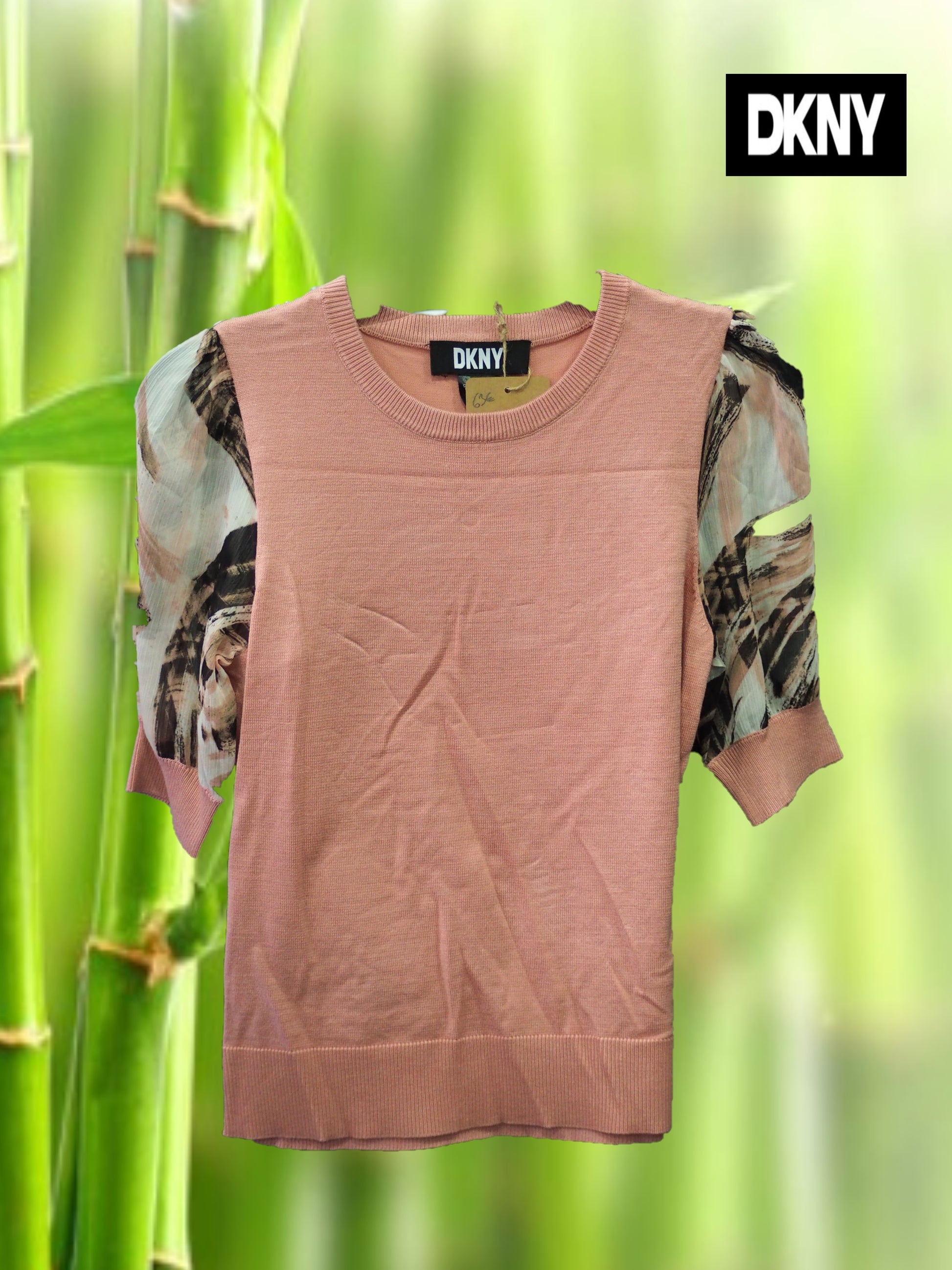 JERSEY ROSA CON MEDIA MANGA DE GASA DKNY