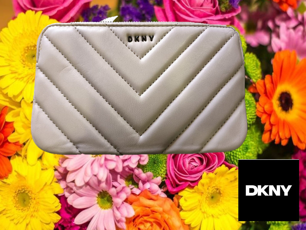 BOLSO PEQUEÑO GRIS ESTILO CARTERA CON ASA LARGA( TARA PEQUENA MANCHA EN ZONA DE CREMALLERA ) DKNY