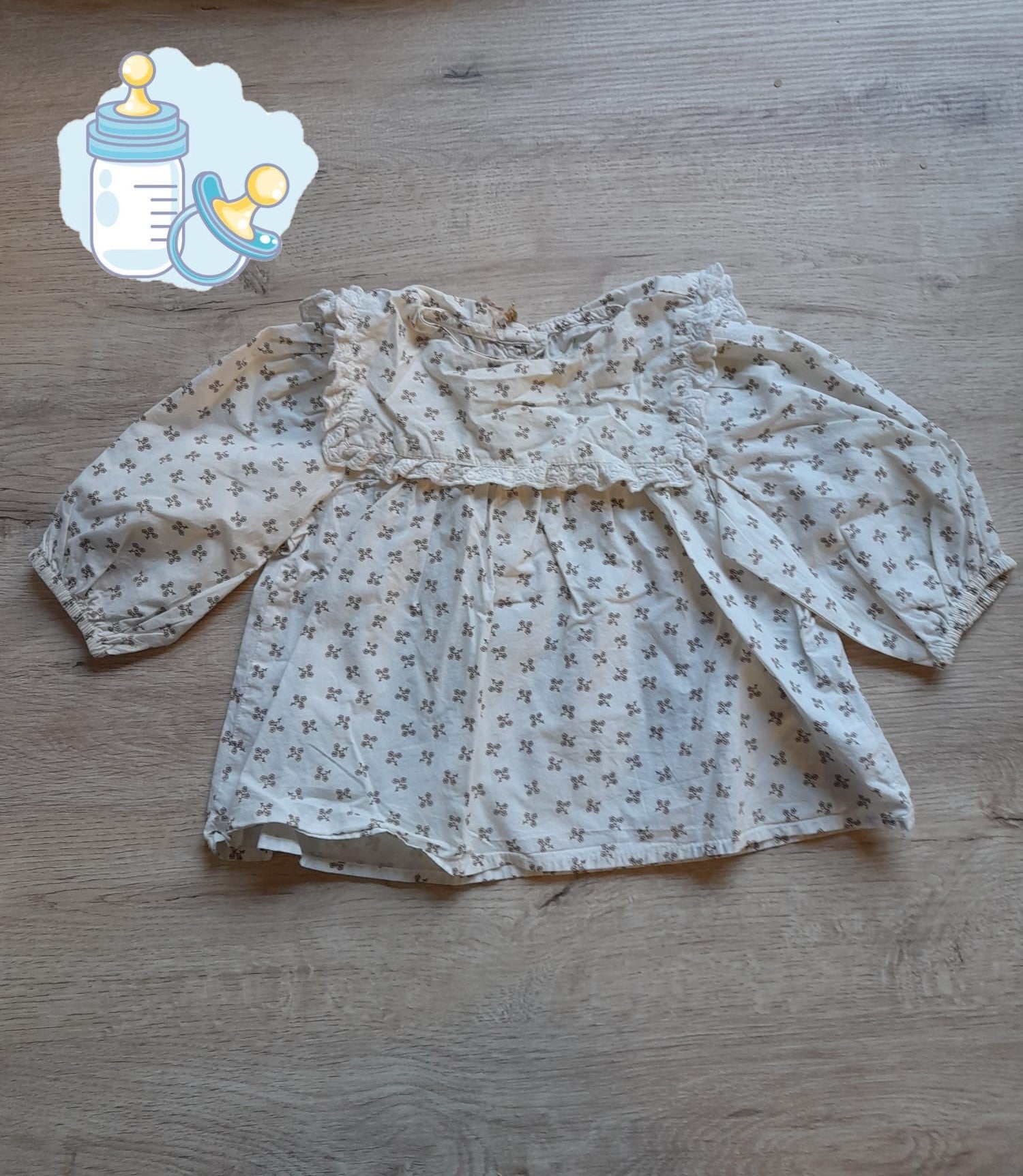 CAMISA BEIGE CON ESTAMPADOS  BEBE