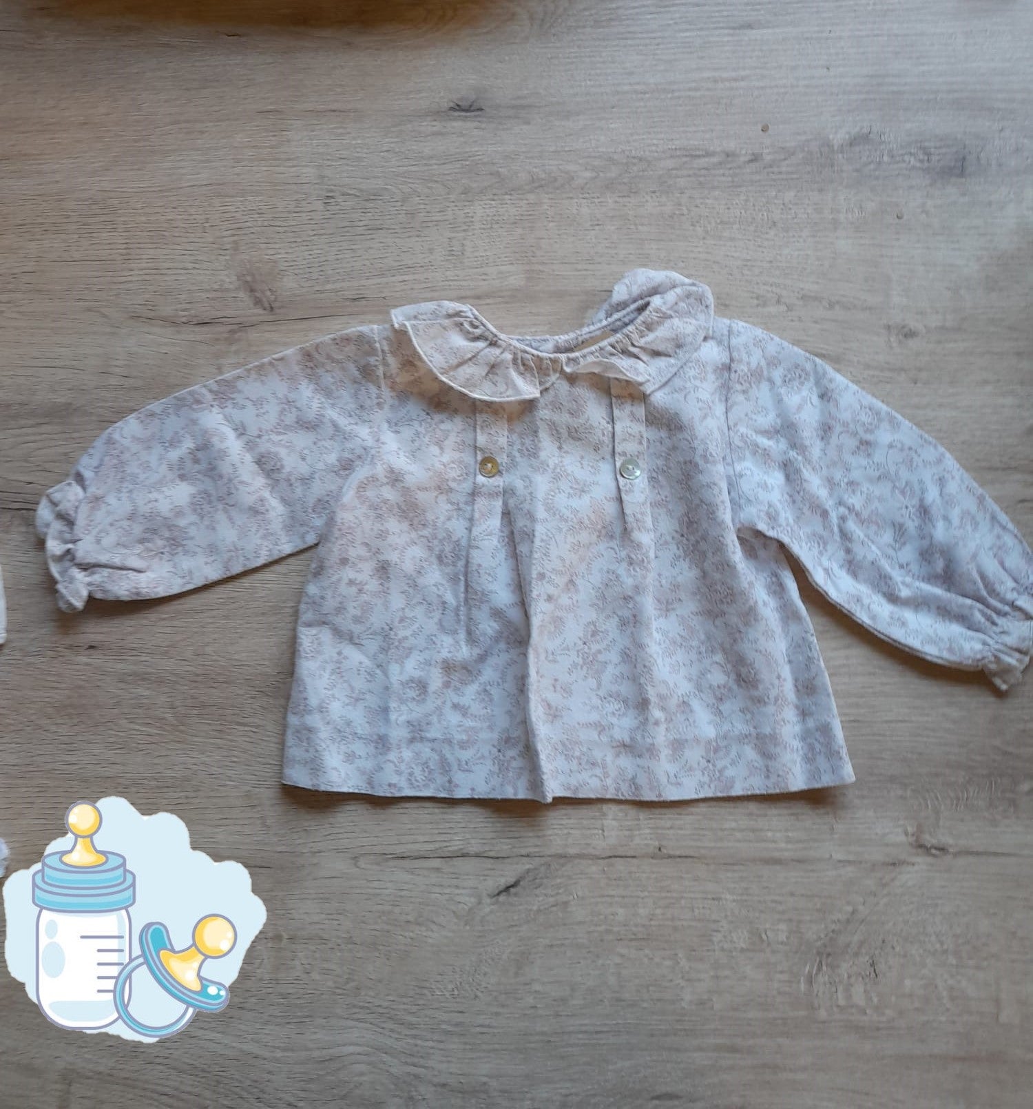 CAMISA BLANCA CON FLORES BEBE