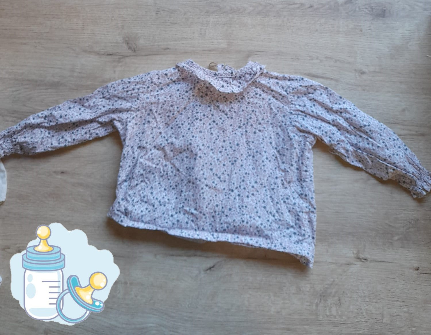CAMISA BLANCA CON FLORES ROSAS BEBE