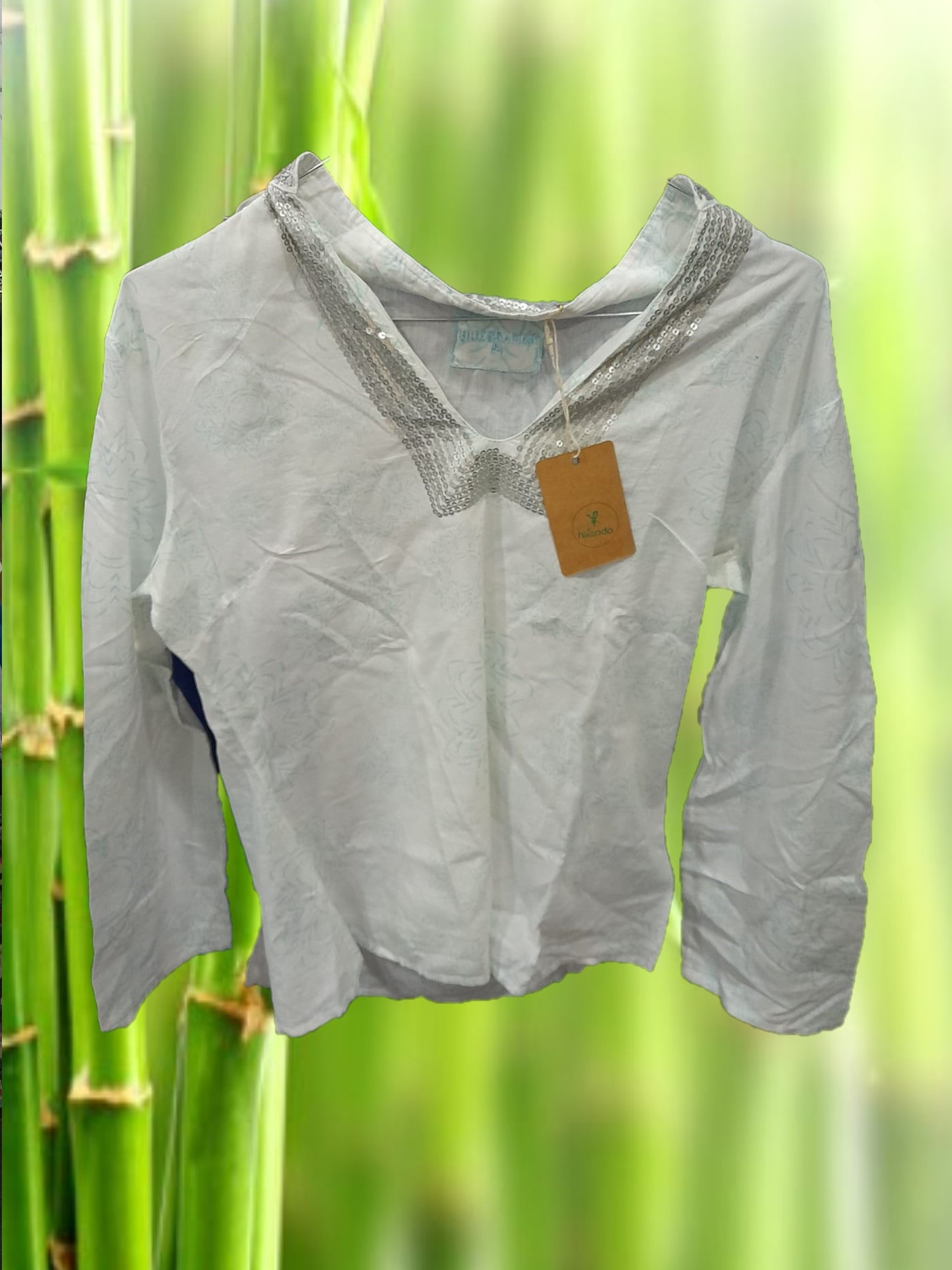 CAMISA MUJER BLANCA CON ESTAMPADO Y DETALLES DE LENTEJUELAS EN EL CUELLO MANGA LARGA
