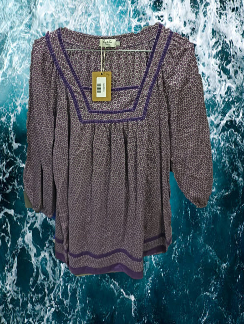 VESTIDO MIDI MORADO CON ESTAMPADO FLORAL Y MANGA LARGA