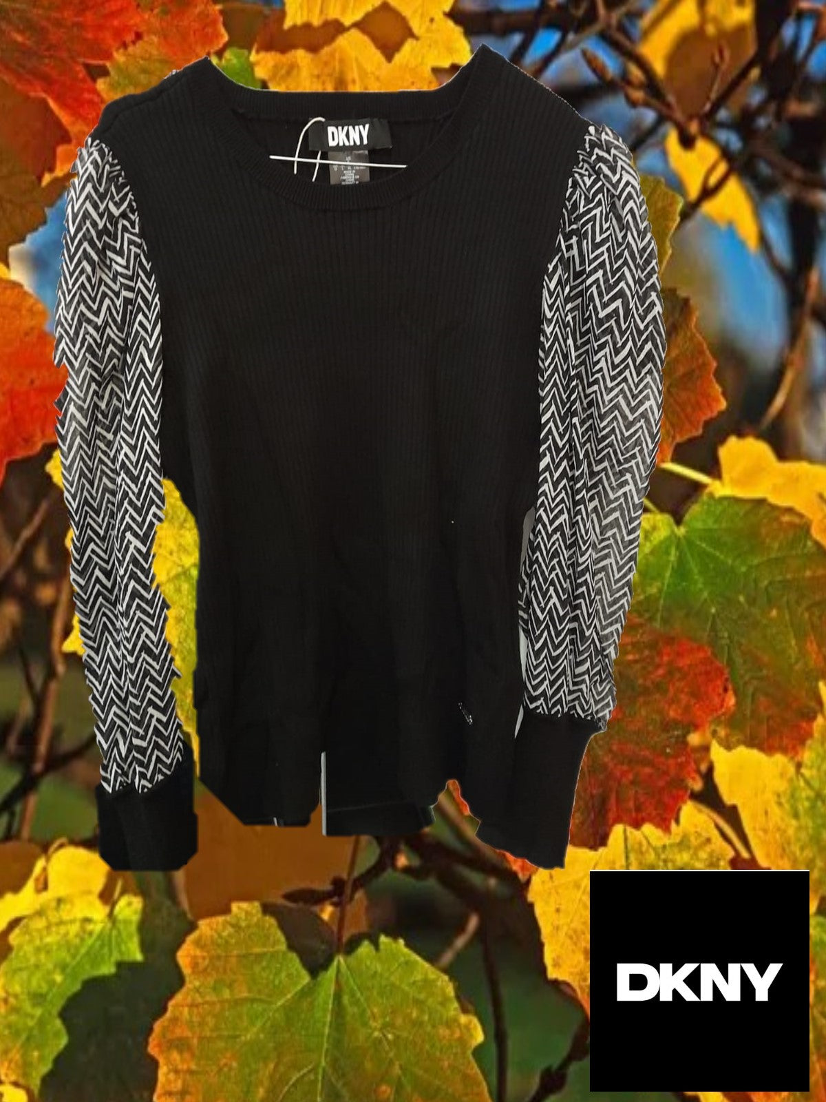 JERSEY NEGRO CON MANGAS EN GASA Y ESTAMPADO GEOMÉTRICO DKNY