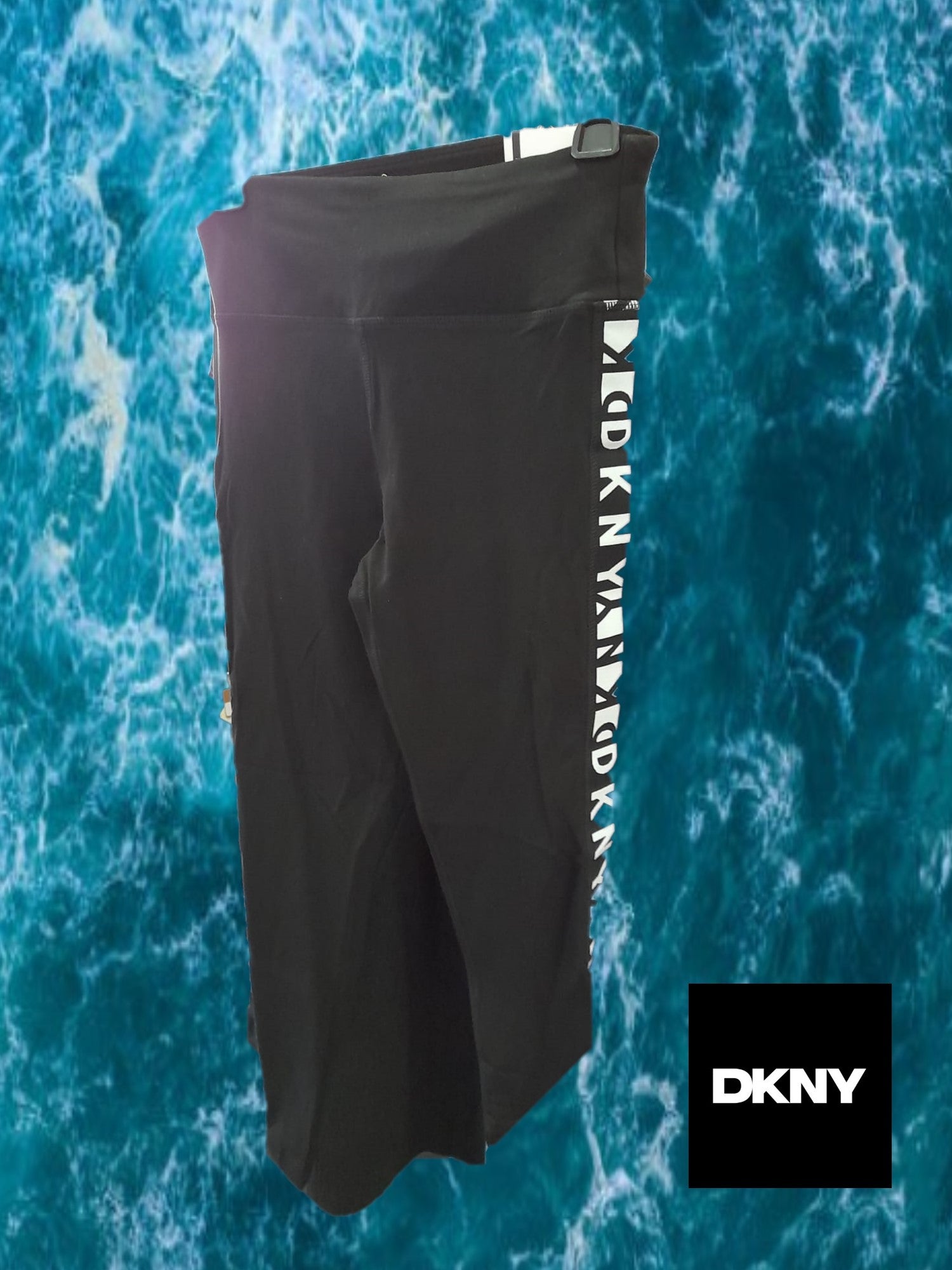 LEGGING NEGRO CON LOGO LATERAL DKNY ( TARA ROTURA DELANTERA )