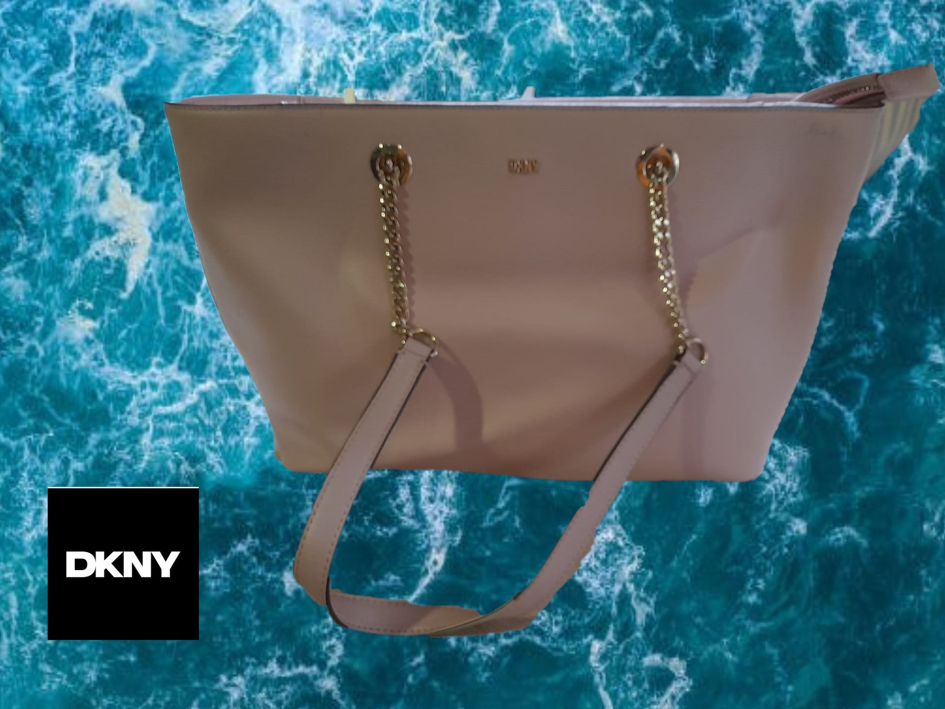 BOLSO ROSA GRANDE PIEL DKNY ( TARA PARTE DELANTERA SUCIA Y ASA DESGASTADA )