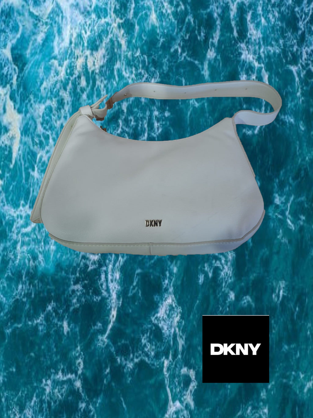 BOLSO PEQUEÑO BLANCO PIEL DKNY ( TARA MANCHAS EN VARIAS ZONAS )