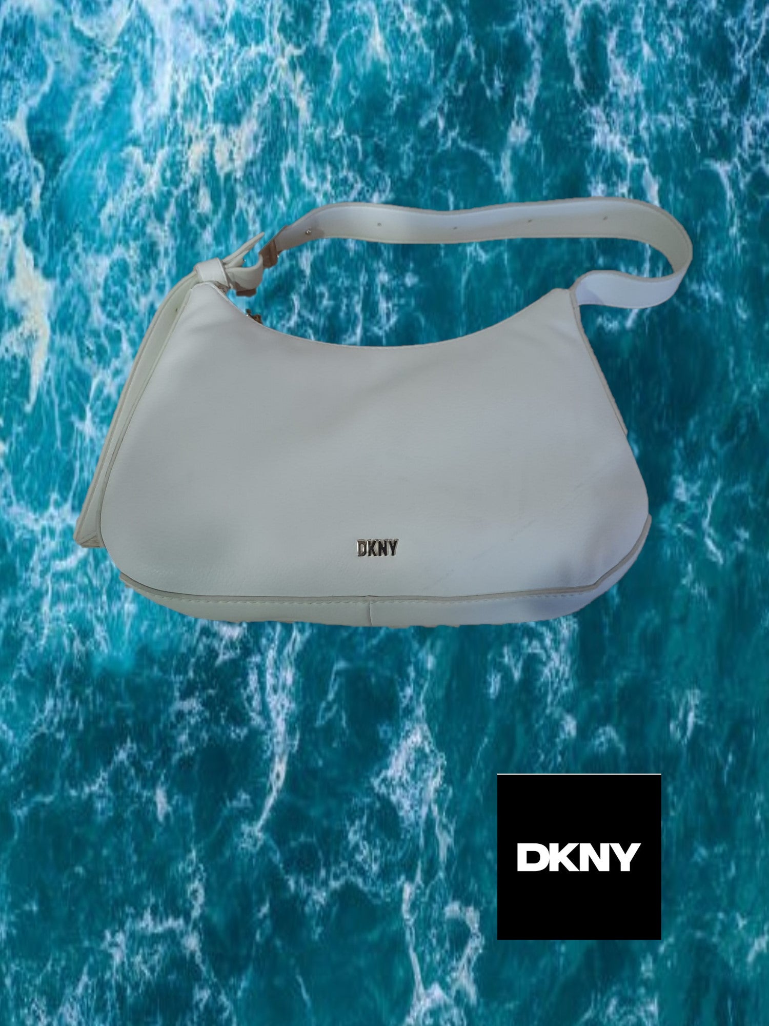 BOLSO PEQUEÑO BLANCO PIEL DKNY ( TARA MANCHAS EN VARIAS ZONAS )