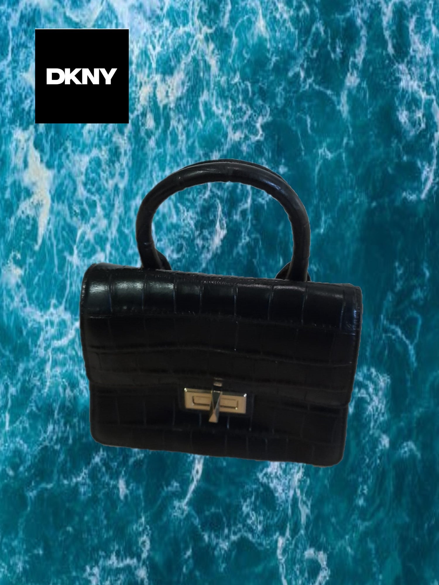 BOLSO MINI NEGRO CON ESTAMPADO COCODRILO DKNY ( TARA FALTA ASA )