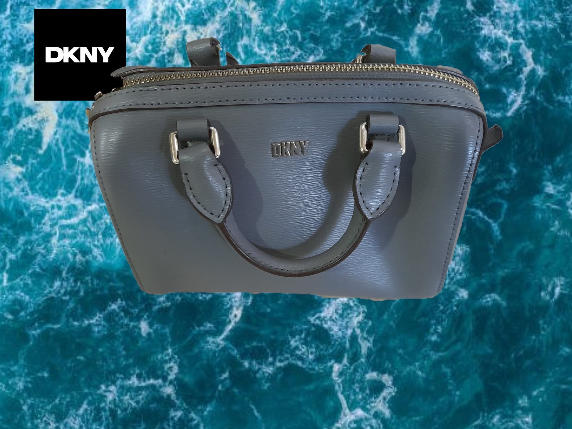 BOLSO MINI GRIS DE PIEL ( ROTURA ENGANCHE ASA Y FALTA ASA LARGA )