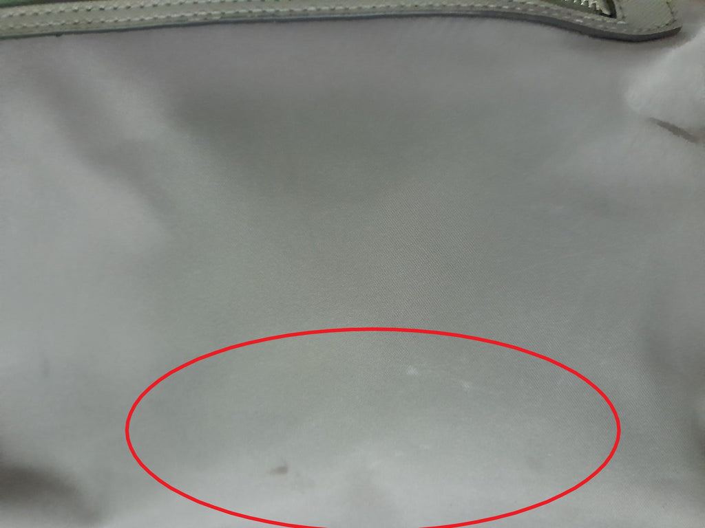 BOLSO GRANDE BEIGE DE TELA DKNY ( TARA MANCHADO PARTE DELANTERA Y ASAS DEFECTUOSAS )