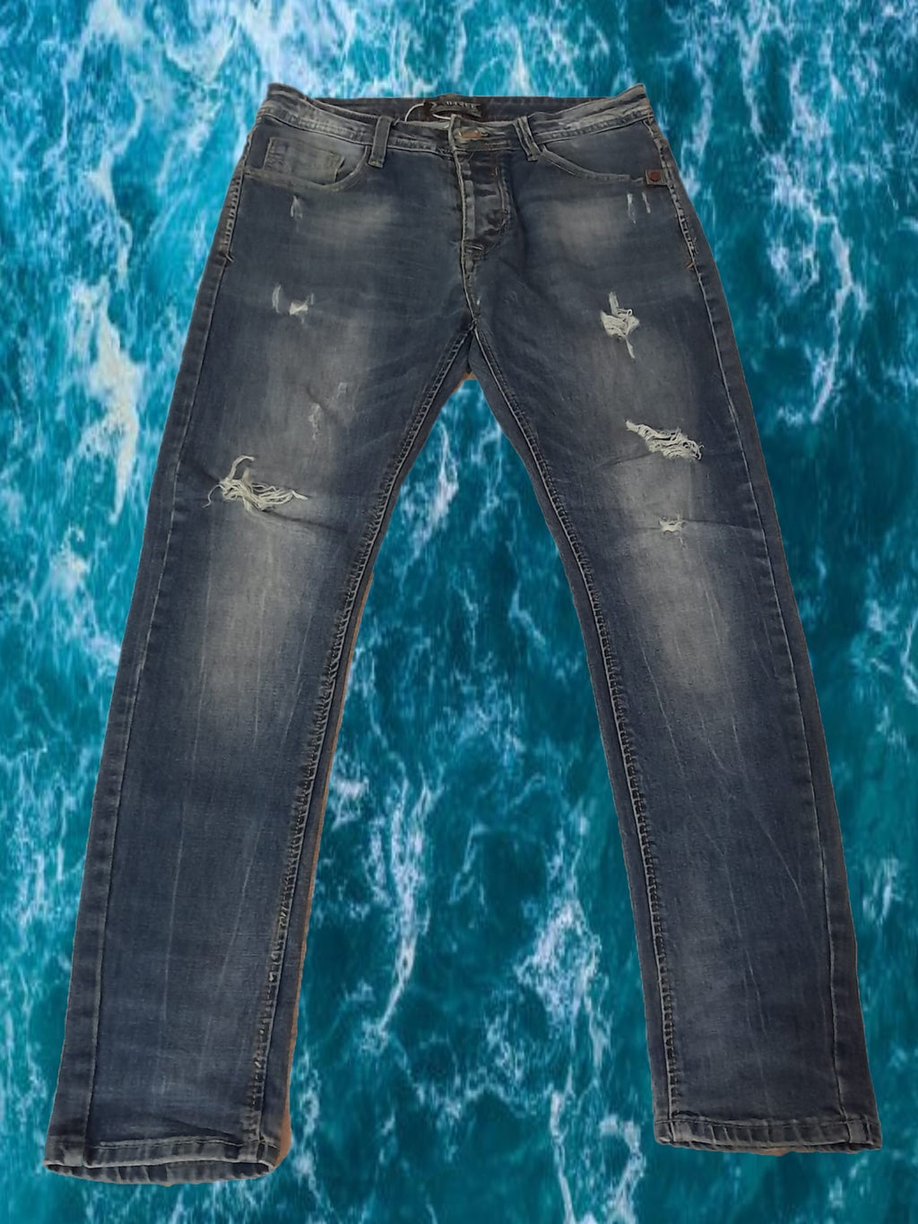 PANTALÓN VAQUERO CABALLERO CON ROTOS