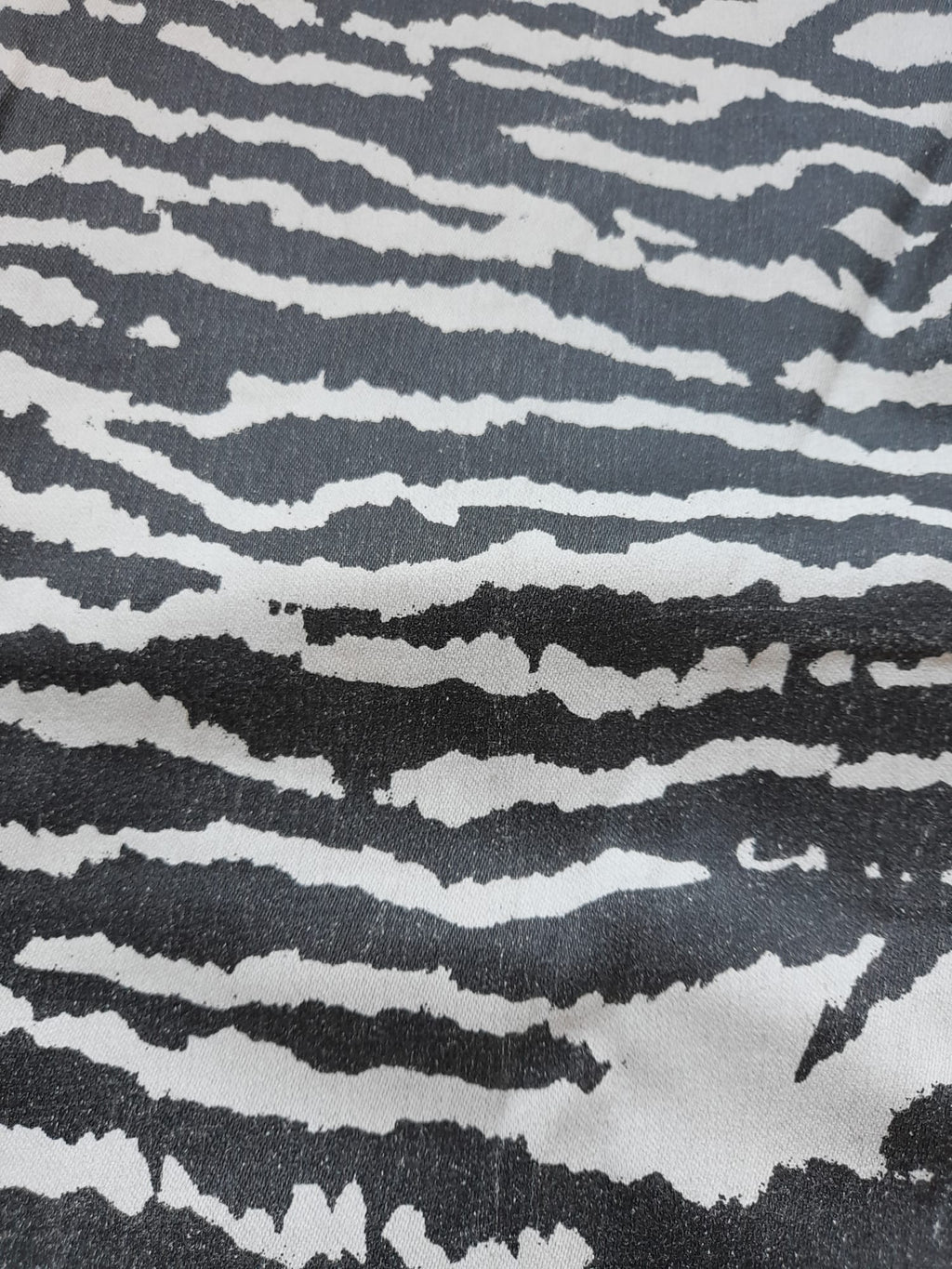 PANTALÓN PITILLO POLIPIEL CON ESTAMPADO DE CEBRA