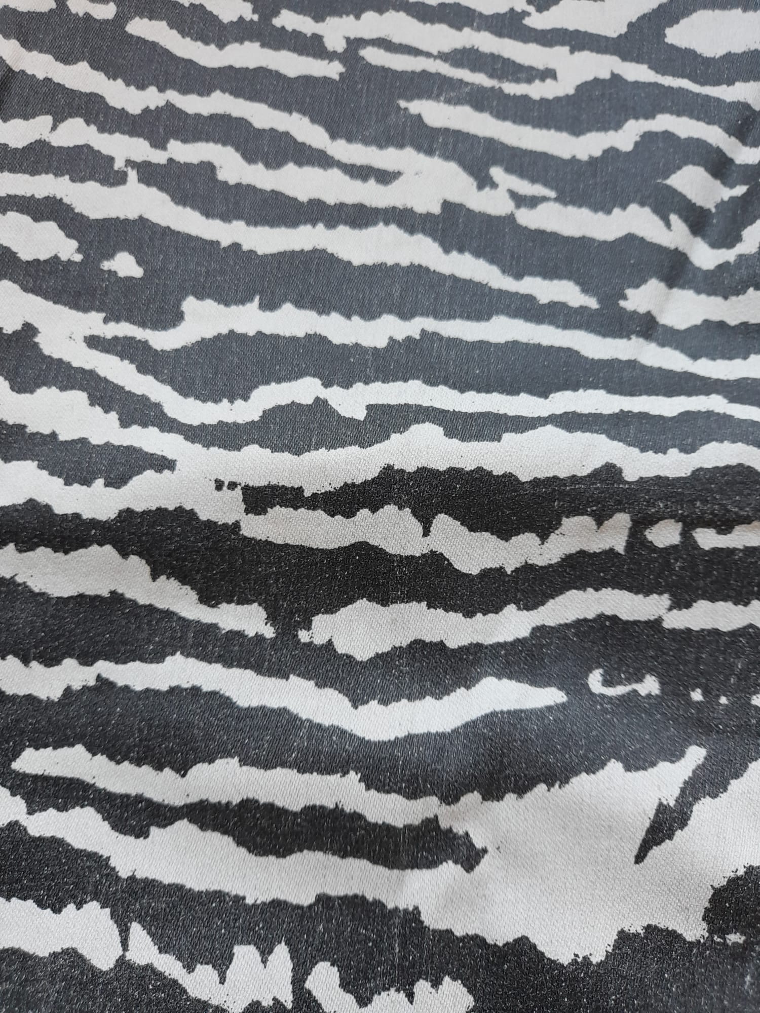 PANTALÓN PITILLO POLIPIEL CON ESTAMPADO DE CEBRA