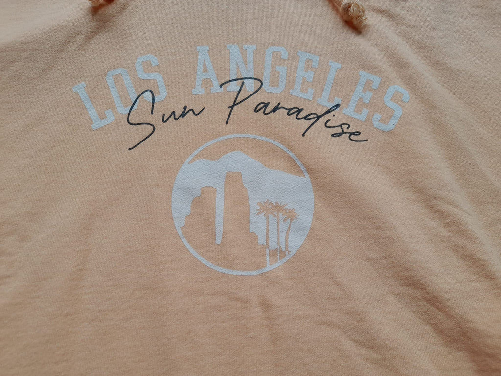 SUDADERA CON CAPUCHA SIN MANGAS Y DIBUJO