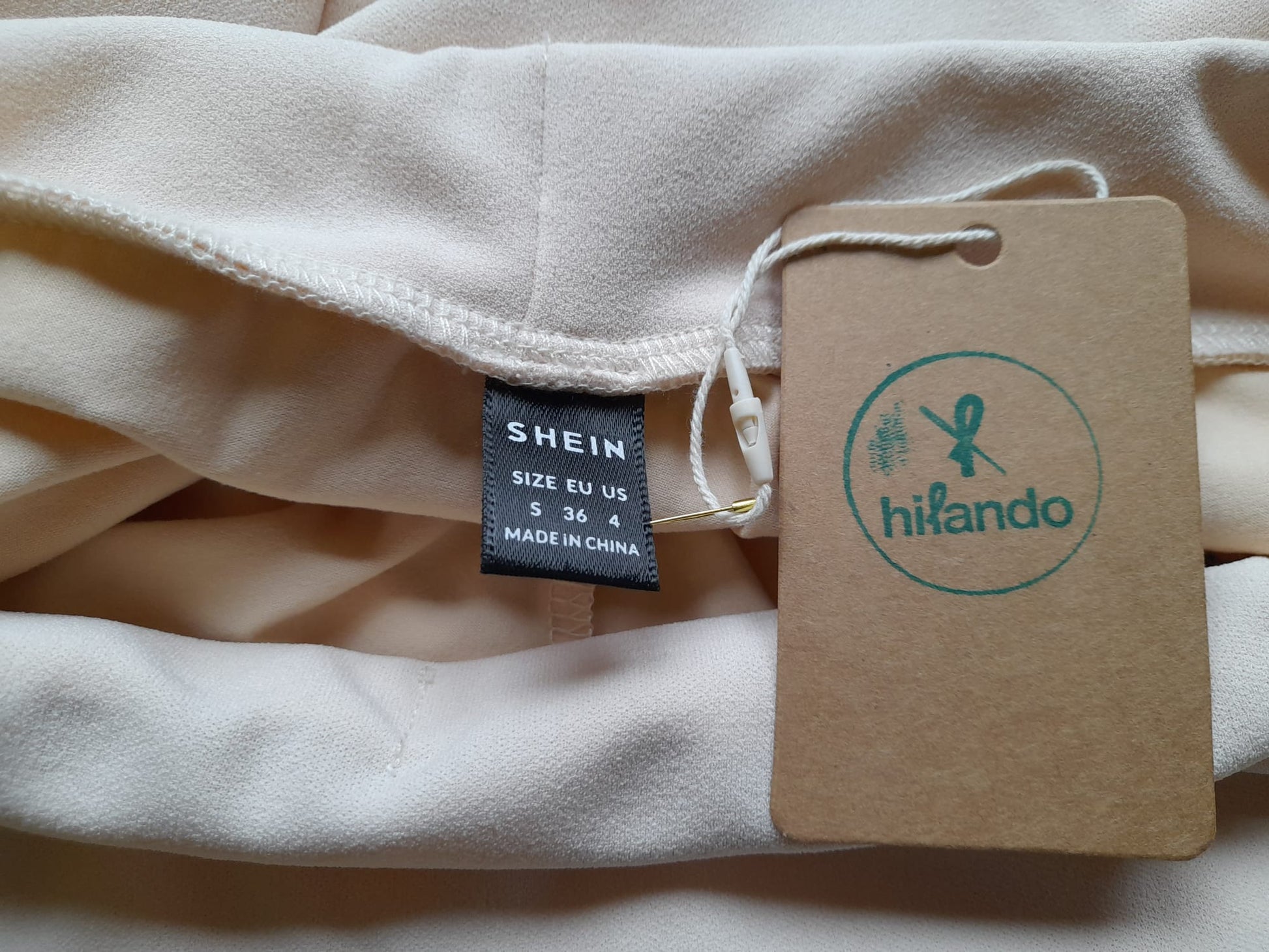 FALDA-PANTALÓN BEIGE ROSADO CORTA CON RIBETE NEGRO