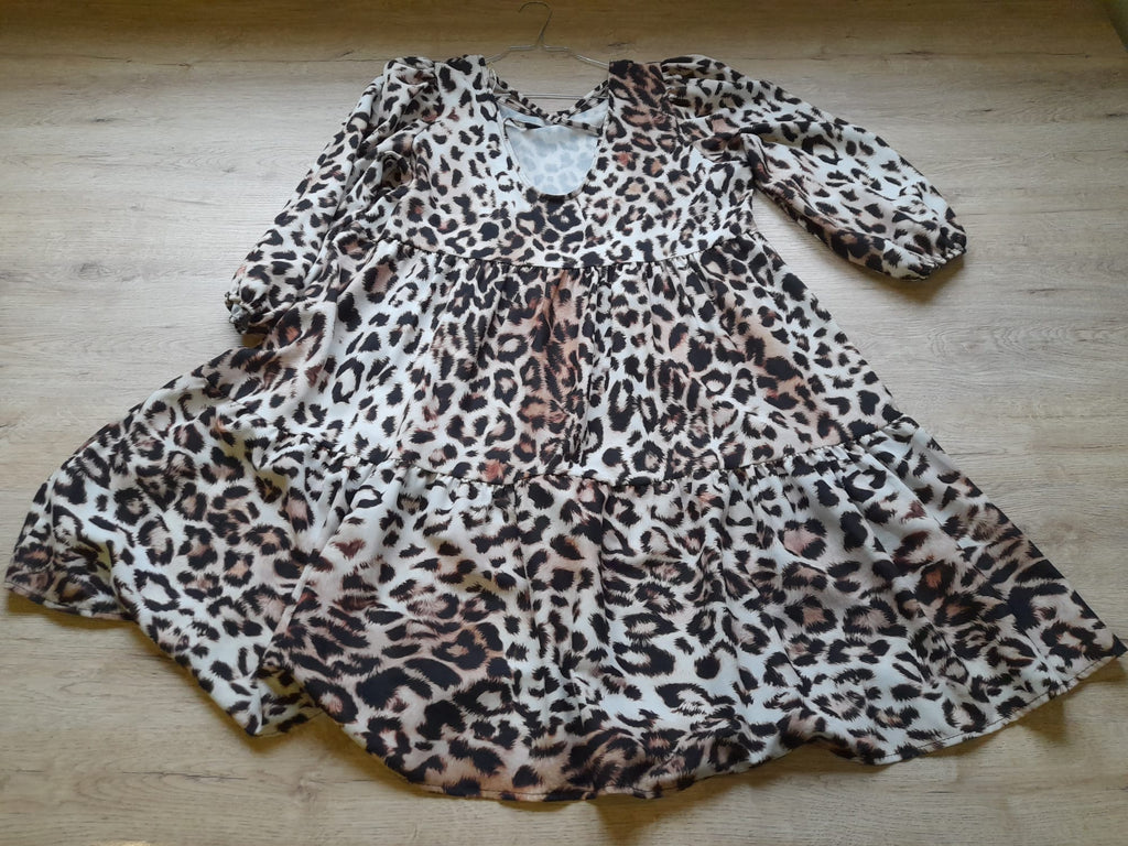 VESTIDO MIDI CON VUELO Y MANGA FRANCESA ESTAMPADO PRINT