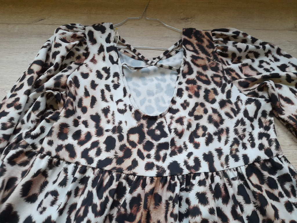 VESTIDO MIDI CON VUELO Y MANGA FRANCESA ESTAMPADO PRINT