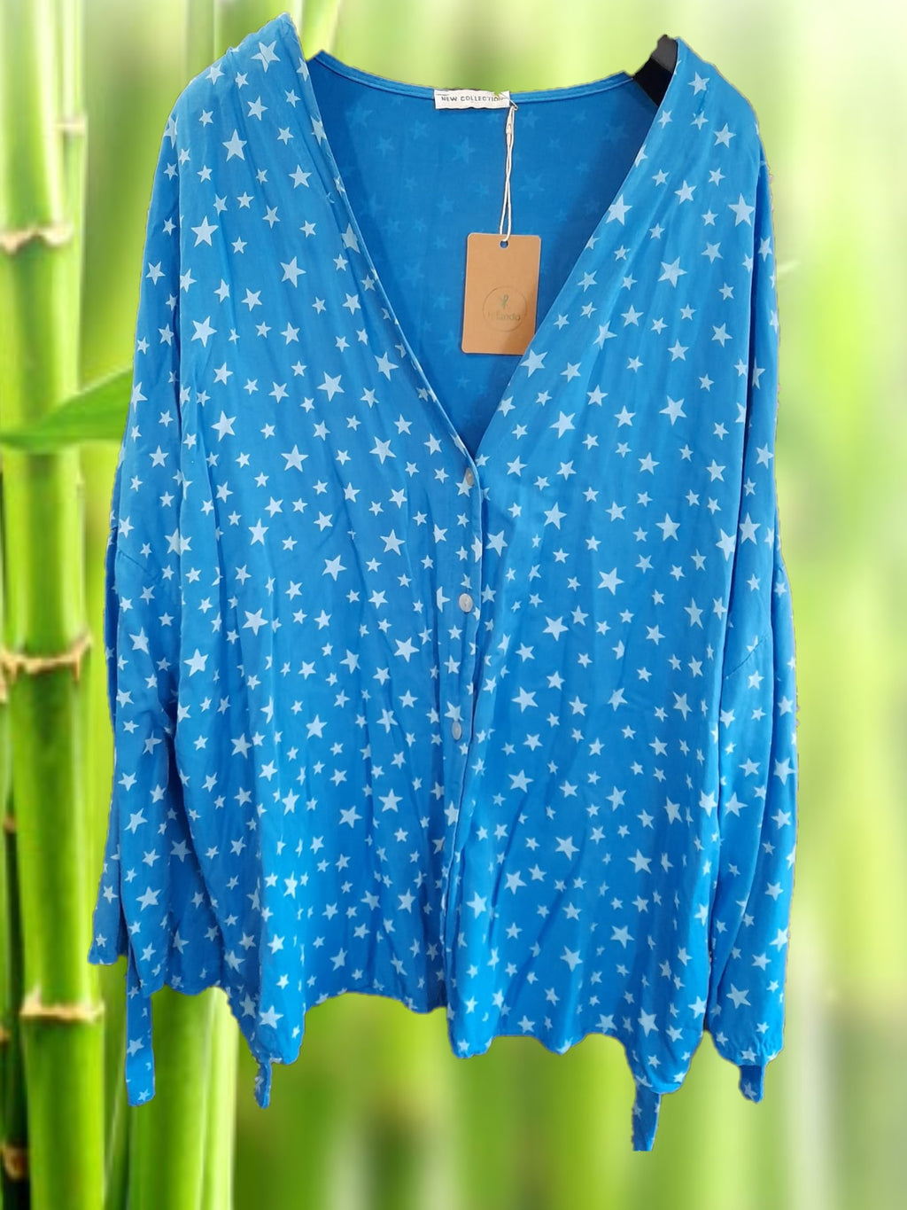 BLUSA M/L CON ESTAMPADO DE ESTRELLAS (posibilidad de anudar las mangas para hacerlas más cortas )