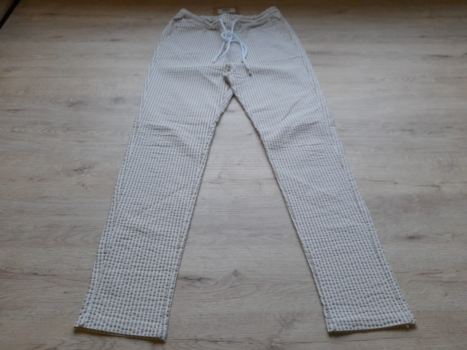 PANTALÓN BLANCO CON RAYAS BEIGE Y GOMA EN CINTURA