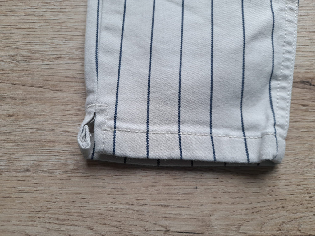 PANTALÓN BLANCO CON RAYAS AZULES ELÁSTICO