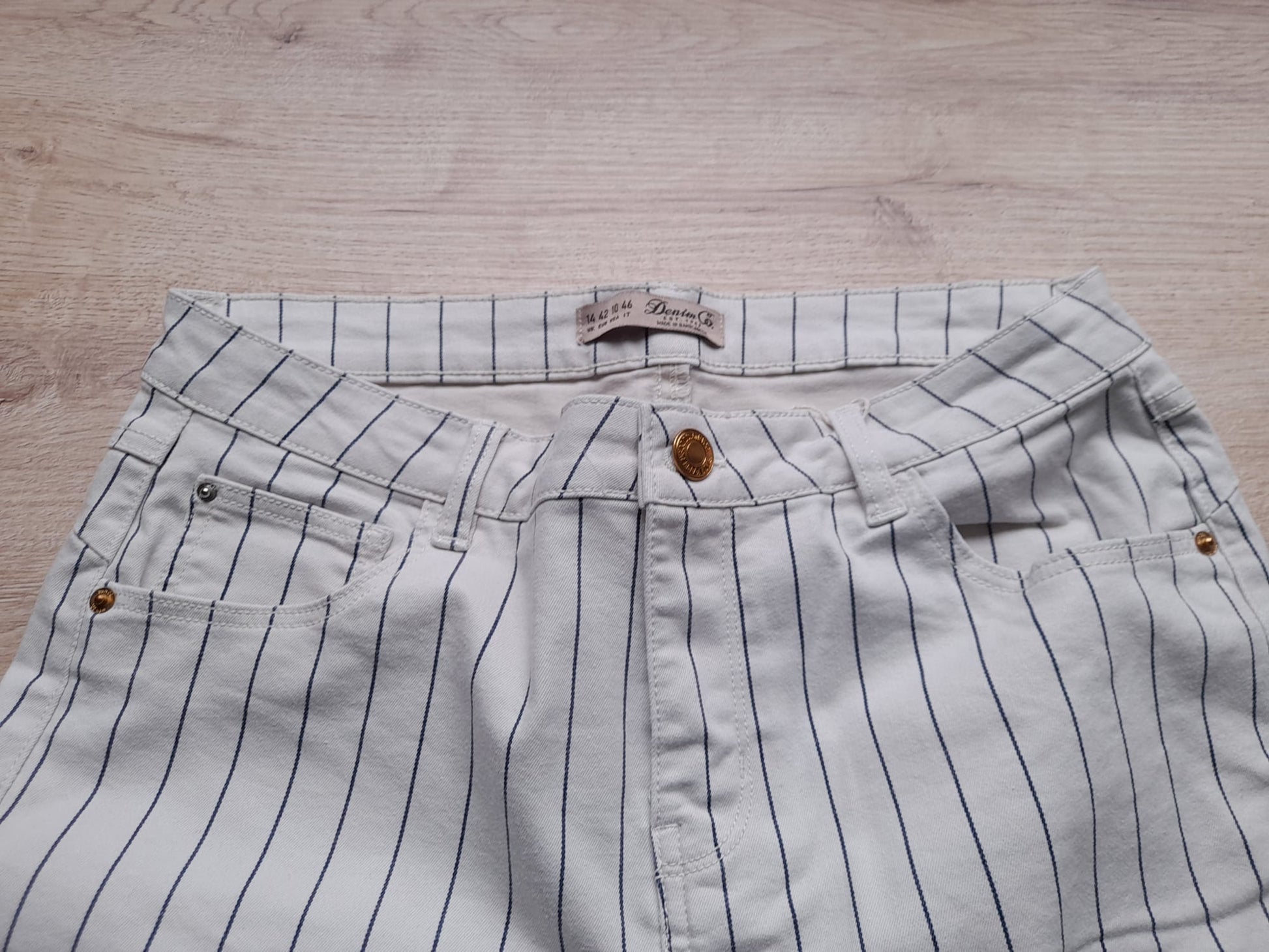 PANTALÓN BLANCO CON RAYAS AZULES ELÁSTICO