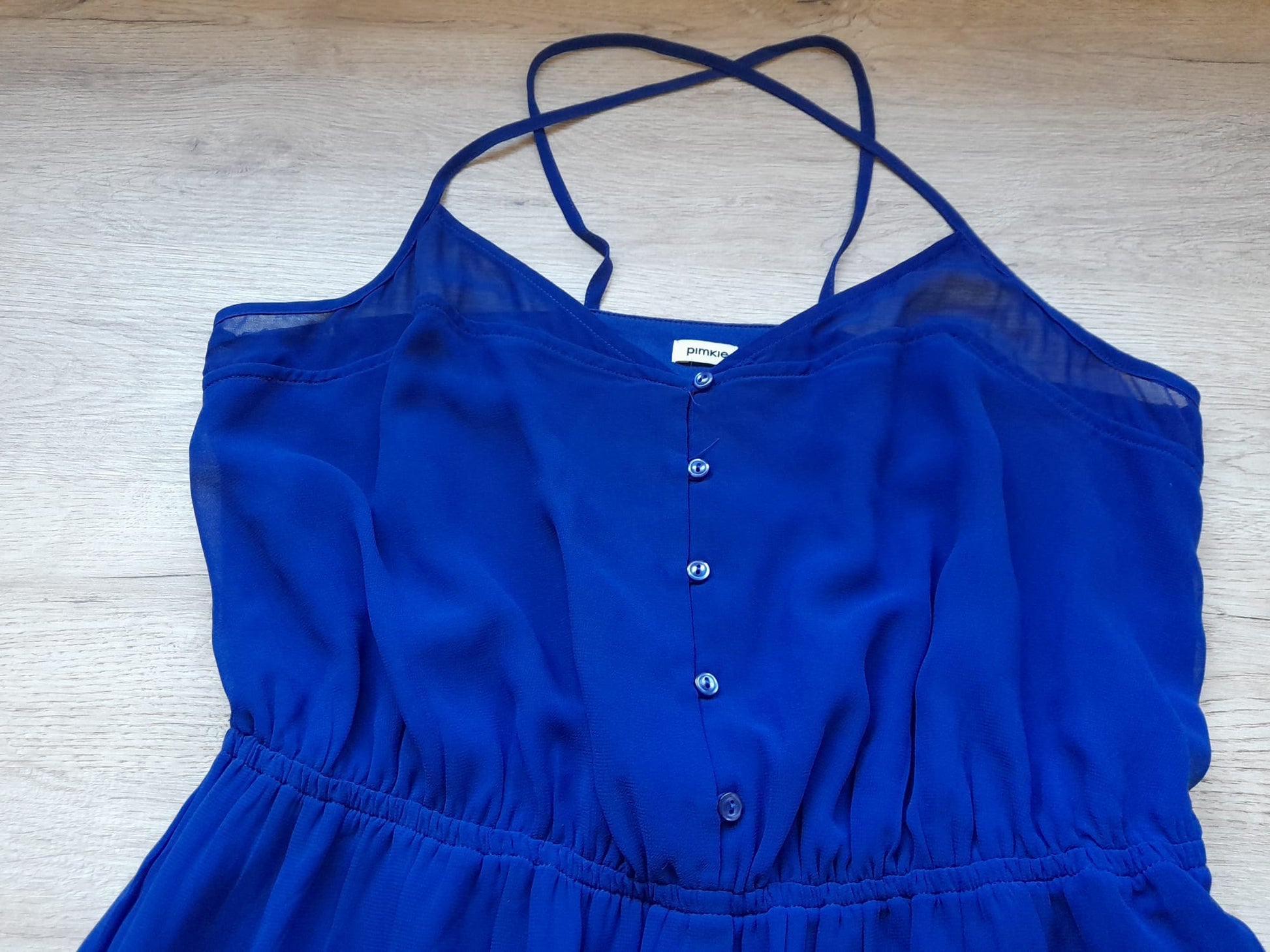 VESTIDO GASA CON FORRO AZUL Y TIRANTES CRUZADOS (PEQUEÑO ENGANCHÓN PARTE TRASERA -FOTO-)