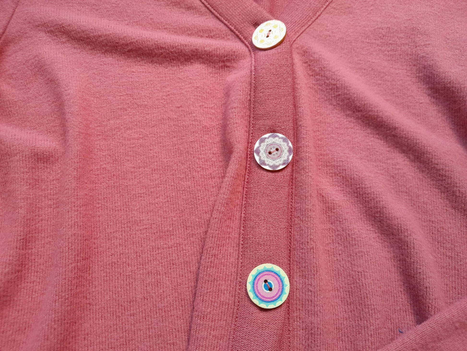 CHAQUETA DE PUNTO COLOR TEJA CON POSIBILIDAD DE LAZO CINTURA