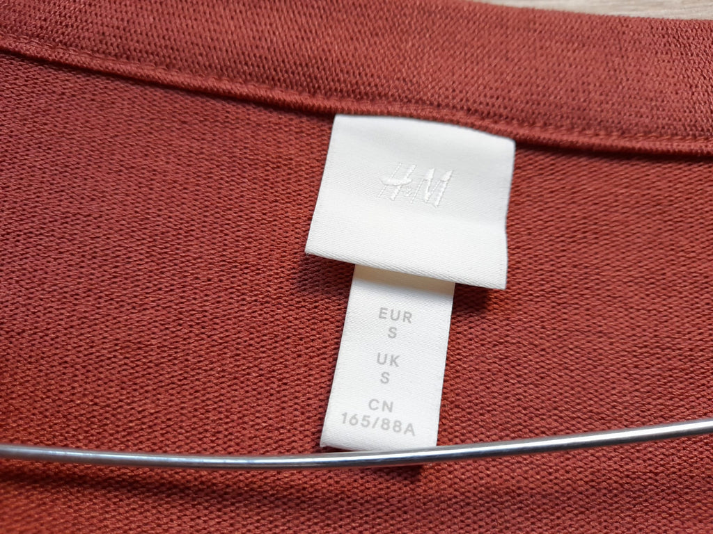 CHAQUETA DE PUNTO COLOR TEJA CON POSIBILIDAD DE LAZO CINTURA