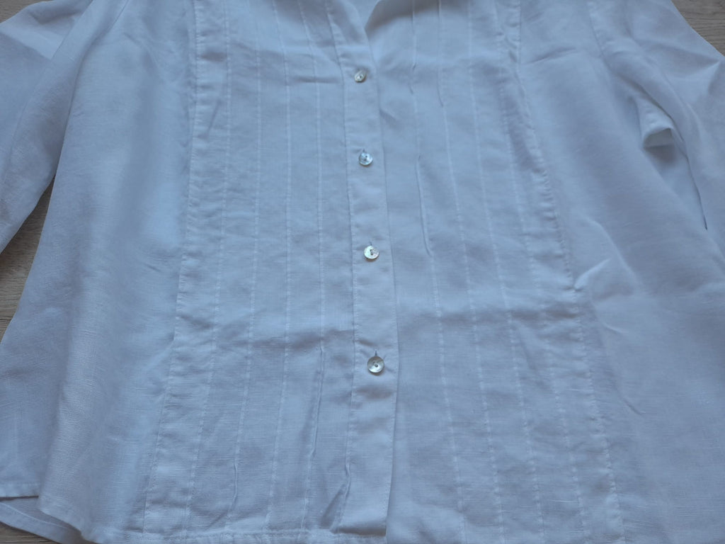 BLUSA BLANCA CON MANGA FRANCESA Y HOMBRERAS